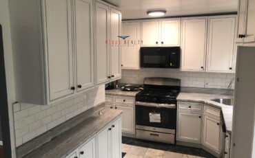 Updated 3-bedroom apartment in Astoria with parking $3500