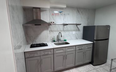 Spacious 2 Bedroom Basement apartment in Woodside $2500